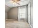 Upstairs bedroom with neutral carpet, bright light, and white trim at 3912 Grace Ct, Indian Trail, NC 28079