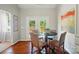 Cozy dining area boasts wood floors and natural light from French doors at 3912 Grace Ct, Indian Trail, NC 28079