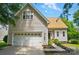 Charming home with well-maintained landscaping, attached garage, and inviting entrance at 3912 Grace Ct, Indian Trail, NC 28079