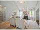 Bright living room features a fireplace, ceiling fan, and a neutral color palette at 3912 Grace Ct, Indian Trail, NC 28079