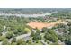 Aerial view of a lake community surrounded by lush trees, showcasing residential homes and new development at 4250 N Center St, Hickory, NC 28601
