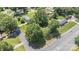 Aerial view of the property in a tranquil neighborhood, showcasing mature trees and landscaped yards at 4250 N Center St, Hickory, NC 28601