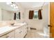 Functional bathroom with a bathtub/shower combo and vanity with a peach-colored sink at 4250 N Center St, Hickory, NC 28601