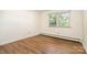 Inviting bedroom with wood-look flooring and natural light from the window at 4250 N Center St, Hickory, NC 28601