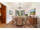 Elegant dining room featuring a chandelier, large window, and tasteful decor at 4250 N Center St, Hickory, NC 28601