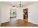 Open floor plan showcases dining room leading into the kitchen and living room with hardwood floors at 4250 N Center St, Hickory, NC 28601