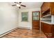 Kitchen with eat-in dining area features natural wood cabinets and a view to the outdoors at 4250 N Center St, Hickory, NC 28601