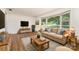 Inviting living room featuring a large window, comfortable sofa, and stylish decor at 4250 N Center St, Hickory, NC 28601