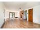 Spacious living room features a fireplace, sliding glass doors, and wood-look flooring at 4250 N Center St, Hickory, NC 28601
