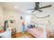Charming bedroom with hardwood floors, decorated walls, canopy bed and ceiling fan at 432 4Th Street Sw Pl, Hickory, NC 28602