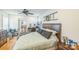 Bedroom showcasing hardwood floors, desk, and a ceiling fan at 432 4Th Street Sw Pl, Hickory, NC 28602