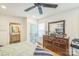 Bedroom showcasing hardwood floors, vanity, and a ceiling fan at 432 4Th Street Sw Pl, Hickory, NC 28602