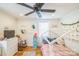 Cozy bedroom with decorative wall art, ceiling fan, and stylish bed at 432 4Th Street Sw Pl, Hickory, NC 28602