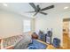 Neutral toned bedroom features ceiling fan, hardwood floors, and ample natural light from the window at 432 4Th Street Sw Pl, Hickory, NC 28602