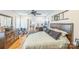 Bedroom showcasing hardwood floors, desk, and a ceiling fan at 432 4Th Street Sw Pl, Hickory, NC 28602