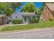 Charming brick home featuring a cozy front porch with well-manicured landscaping and inviting curb appeal at 432 4Th Street Sw Pl, Hickory, NC 28602