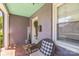 Inviting front porch with comfortable wicker seating and a 'Welcome' sign, creating a warm entry at 432 4Th Street Sw Pl, Hickory, NC 28602