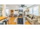Bright, open-concept living area featuring hardwood floors, a breakfast bar, and comfortable seating at 432 4Th Street Sw Pl, Hickory, NC 28602