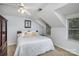 Bedroom featuring a ceiling fan, neutral walls, and a window at 4716 Heatherton Pl, Charlotte, NC 28270