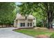 Charming two-story home featuring a driveway and well-manicured lawn at 4716 Heatherton Pl, Charlotte, NC 28270