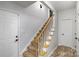 Hallway and staircase with white trim at 4716 Heatherton Pl, Charlotte, NC 28270
