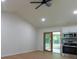 Bright, updated kitchen featuring modern appliances, white cabinets, and wood-look flooring at 5233 Great Wagon Rd, Charlotte, NC 28215