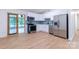 Updated kitchen featuring stainless steel appliances, modern cabinetry, and a stylish backsplash at 5233 Great Wagon Rd, Charlotte, NC 28215