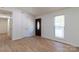 Bright living room with new flooring and lots of natural light at 5233 Great Wagon Rd, Charlotte, NC 28215