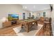 Staged game room with pool table, foosball, television and seating at 560 Blue Sky Dr, Dallas, NC 28034