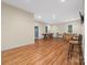 Spacious game room ready for entertainment with wood flooring and ample lighting at 560 Blue Sky Dr, Dallas, NC 28034