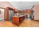 Spacious kitchen features a large island, stainless steel appliances, ample cabinet space, and open layout at 560 Blue Sky Dr, Dallas, NC 28034