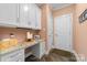Charming mud room with built-in cabinets, granite countertop, and ample storage at 560 Blue Sky Dr, Dallas, NC 28034