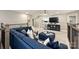 Comfortable living area with plush seating, neutral decor, and carpeted floors, perfect for relaxing and entertaining at 5721 Ballinard Ln, Charlotte, NC 28277