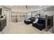Bright and spacious loft area with a comfortable sofa, stylish decor, and an open railing overlooking the lower level at 5721 Ballinard Ln, Charlotte, NC 28277