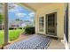 Comfortable patio space with an outdoor rug, offering a view of the landscaped backyard at 6204 Half Dome Dr, Charlotte, NC 28269