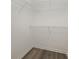 Organized closet featuring wire shelving provides ample storage for clothing and accessories at 6204 Half Dome Dr, Charlotte, NC 28269