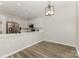 Modern kitchen featuring stainless steel appliances, quartz countertops and sleek white cabinetry at 6204 Half Dome Dr, Charlotte, NC 28269