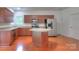 Kitchen featuring stainless steel appliances, granite countertops, and center island with breakfast bar at 6310 Trevor Simpson Dr, Indian Trail, NC 28079