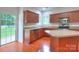 Bright kitchen with stainless appliances, a breakfast bar island, and modern cabinetry at 6310 Trevor Simpson Dr, Indian Trail, NC 28079
