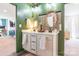 Well-lit bathroom with dual sinks, modern fixtures, and updated cabinets for a clean, contemporary look at 651 Melville Dr, Rock Hill, SC 29732