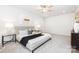 Cozy bedroom with neutral decor, a comfortable bed, and stylish furnishings at 737 Oak St, Charlotte, NC 28214