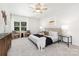 Well-lit bedroom with comfortable seating area and large window at 737 Oak St, Charlotte, NC 28214