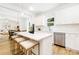 Bright, open kitchen with a breakfast bar, stainless steel appliances, and natural light at 737 Oak St, Charlotte, NC 28214