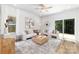 Elegant living room featuring a comfortable sofa, stylish decor, and ample natural light at 737 Oak St, Charlotte, NC 28214