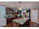 Kitchen featuring a large island with seating, granite countertops, and stainless steel appliances at 792 Carolina Mill Cir, Lincolnton, NC 28092