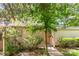 Exterior shot of a home featuring neutral siding and well-maintained landscaping at 8005 Horse Chestnut Ln, Charlotte, NC 28277