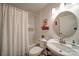 Clean bathroom with a shower-tub, tile walls, a modern sink and a large mirror at 801 Witmore Rd, Wingate, NC 28174