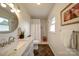 This bathroom features a marble vanity, tile floors, and a shower at 801 Witmore Rd, Wingate, NC 28174