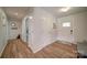 Bright foyer with hardwood floors and a welcoming front door with sidelights at 801 Witmore Rd, Wingate, NC 28174