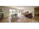 Bright living area with hardwood floors, natural light, and a view of the backyard at 801 Witmore Rd, Wingate, NC 28174